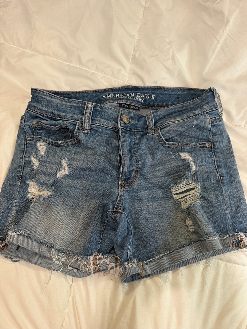 American Eagle Outfitters Midi Light Blue Distressed Denim Jean Shorts